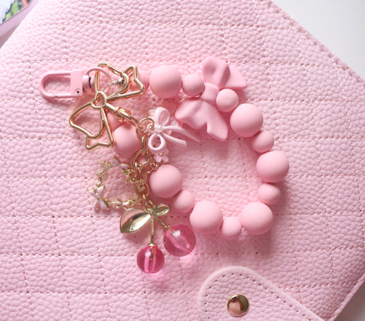 BINDER KEYCHAIN BEADED BOW