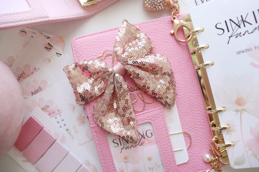 SEQUIN BINDER BOW